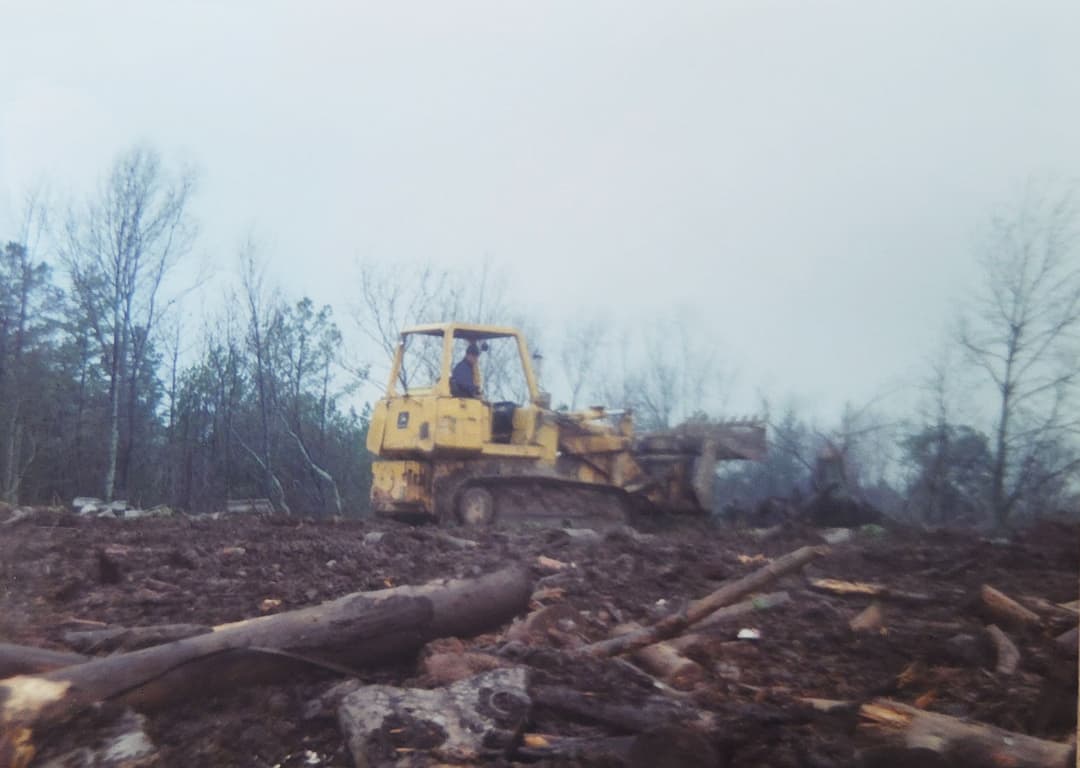 Granddaddy on his track loader — one of the strongest images burned into my mind. Every job, every push of dirt was done with pride and purpose.