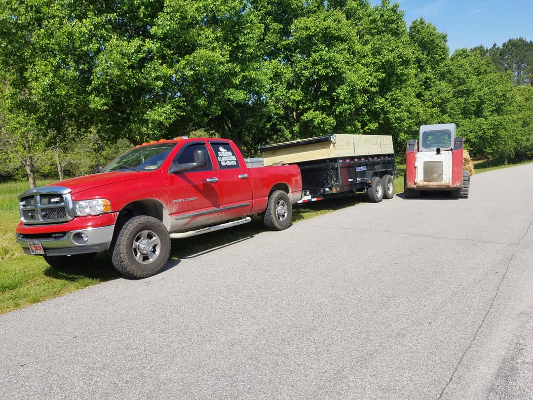 his was just a few days after me and my granddaddy had finished adding the new sideboards on top of my dump trailer. He helped me put them on and guided me through how to do it. A few days later, seeing my logo on the side of that truck while working a job for a homeowner — that was a proud moment. It finally felt real. Just a young kid with a dream, and a granddaddy who believed in him from the very start.