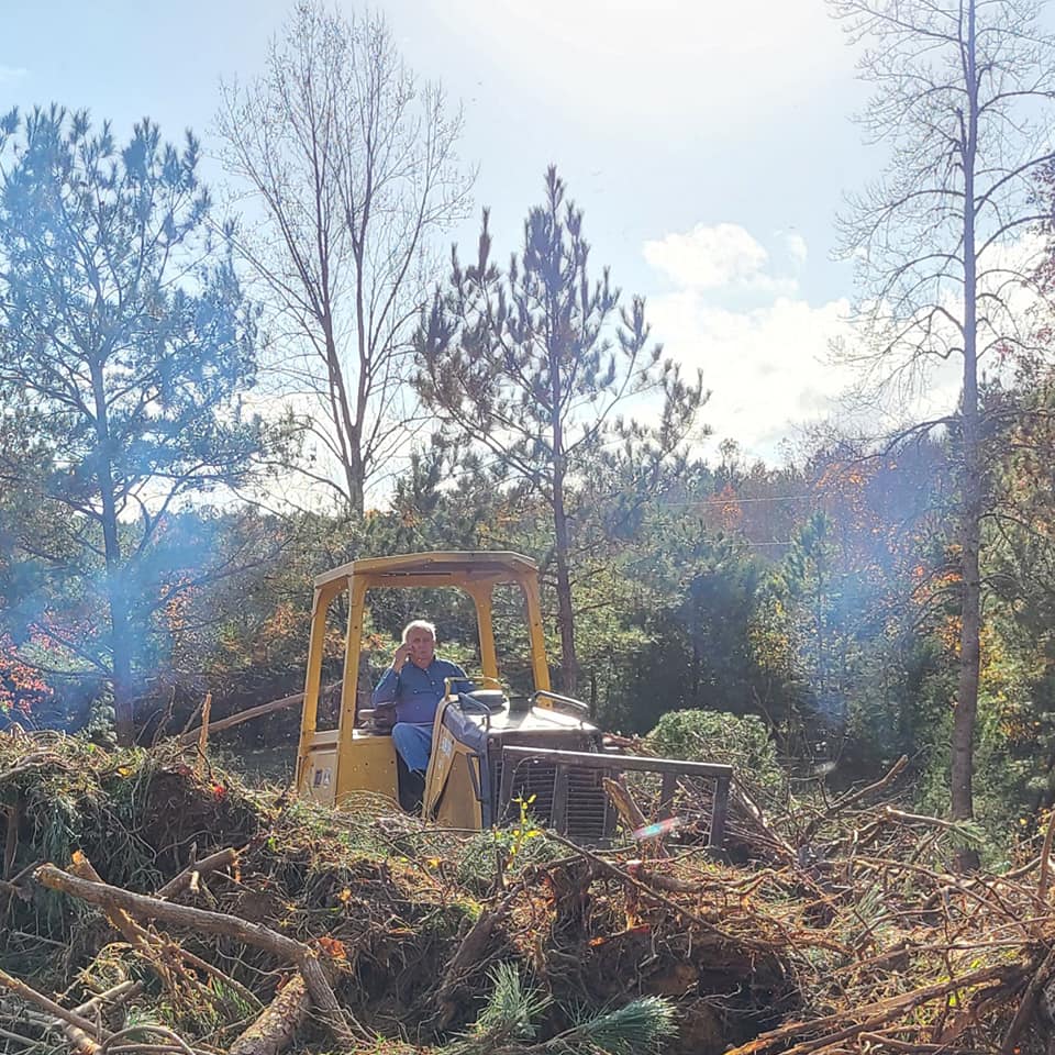 My grandpa out on one of my jobs, back on the dozer where it all started. Even in his later years, he still loved being behind the controls — and I still loved learning from him. There’s nothing like watching the man who taught you everything still doing what he loves.