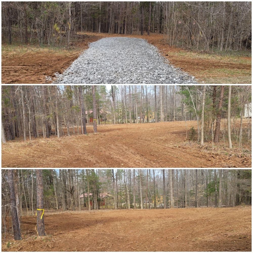 New gravel path through a cleared forest area with freshly tilled soil on either side.
