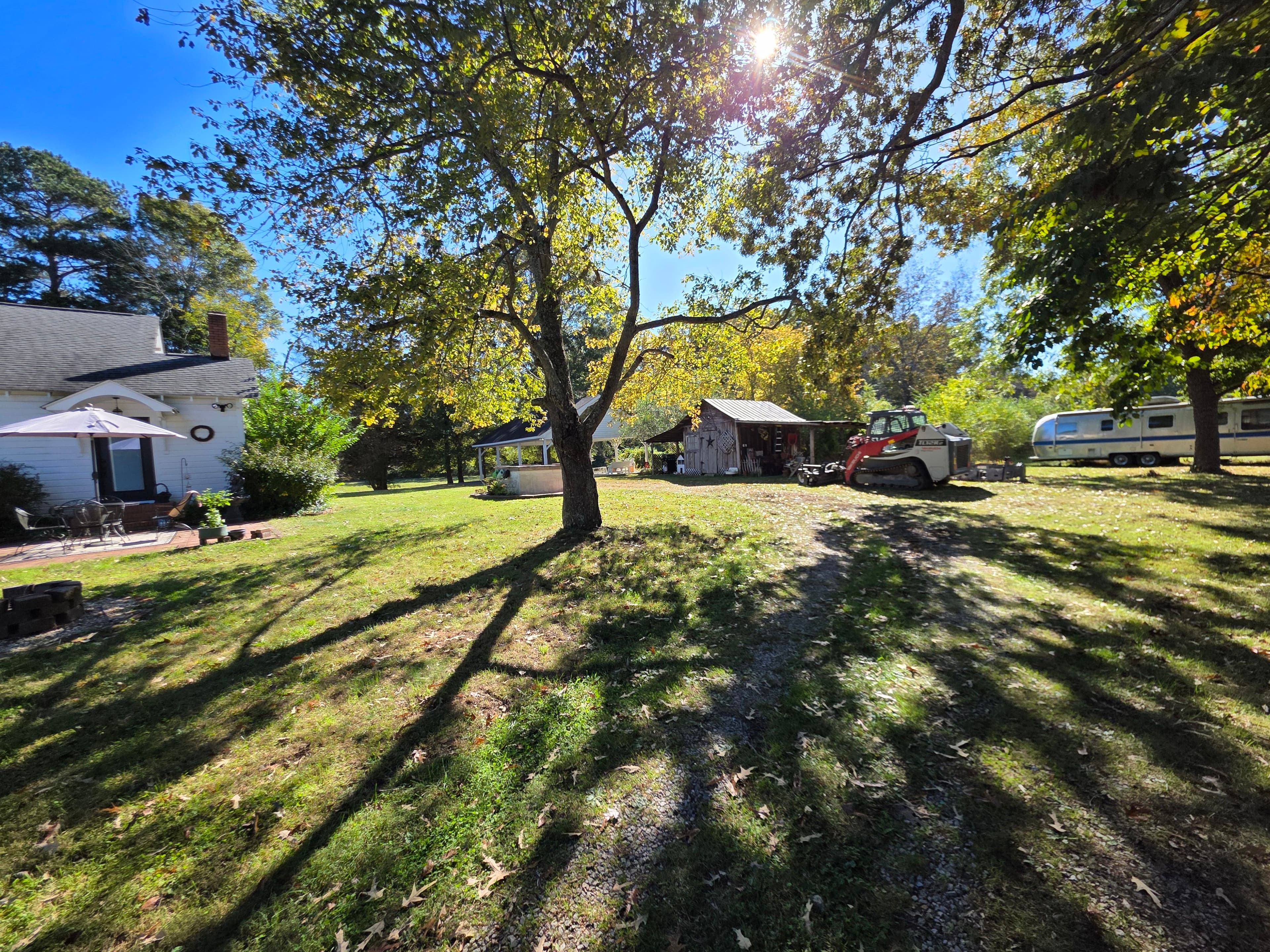 Rural driveway area before gravel driveway installation and grading work